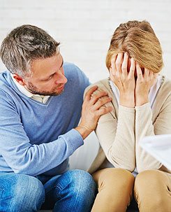 A married couple turning back toward each other in marriage counselling
